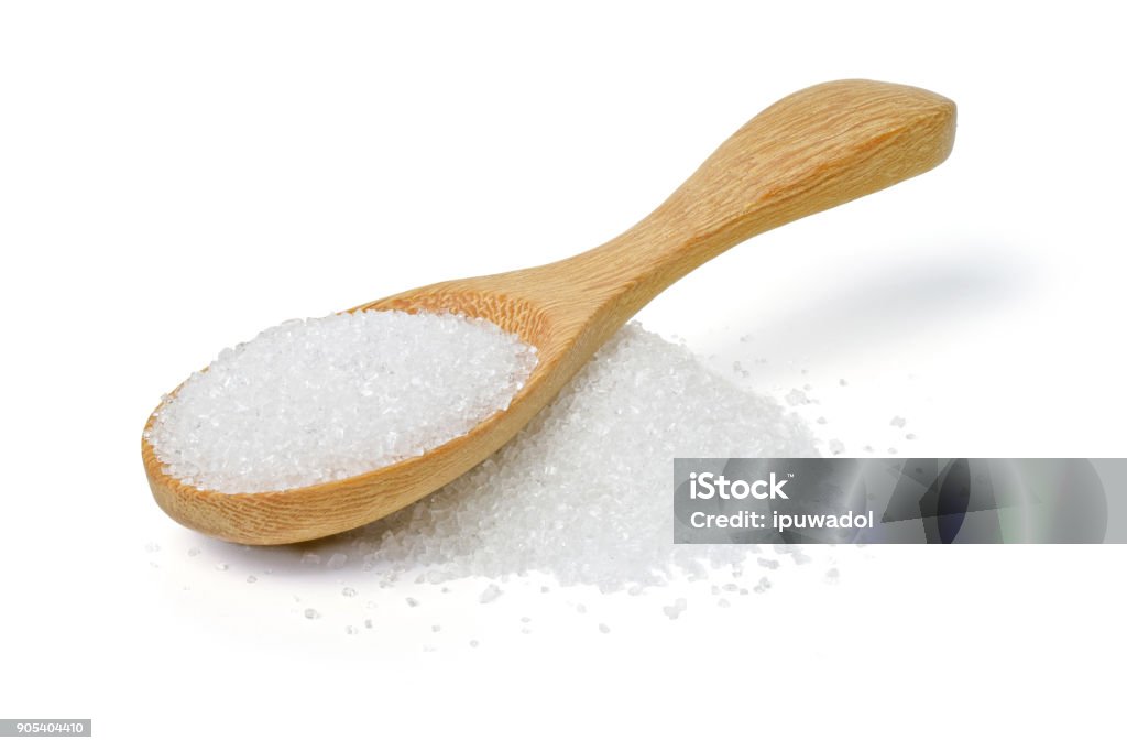 white sugar in wood spoon on white background white sugar in wood spoon on a white background Sugar - Food Stock Photo
