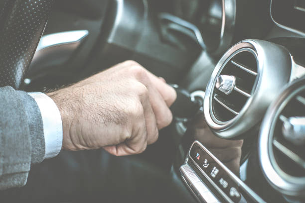 istock Close up of human hand. Using car key. 905409046