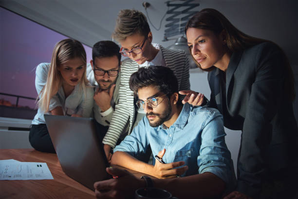 istock Business people working together late 905428994