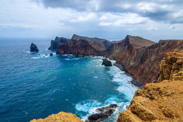 istock Beautiful coast with high cliffs on Madeira island, Portugal 905433448