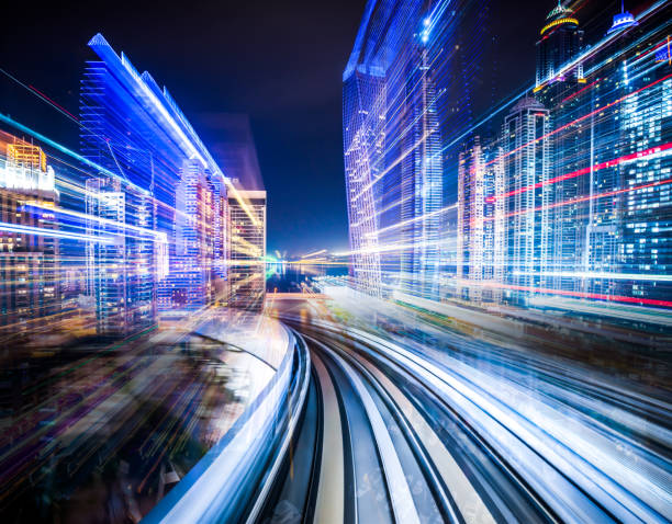 ville en mouvement - night cityscape dubai long exposure photos et images de collection