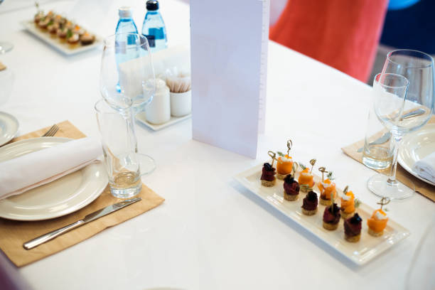 istock Tables set for an event, catering table set 905434760