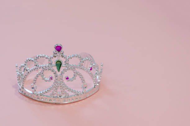 istock Crown princess on a pink background 905434814