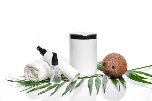 istock Organic cosmetics with coconut on white background 905445082
