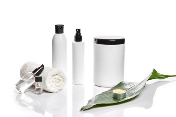 istock Set of cosmetic products in white containers on light background 905448206
