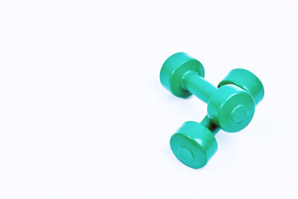 istock Fitness equipment on a dark background, on a white background 905448424