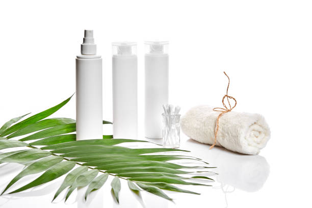 istock Set of cosmetic products in white containers on light background 905448920