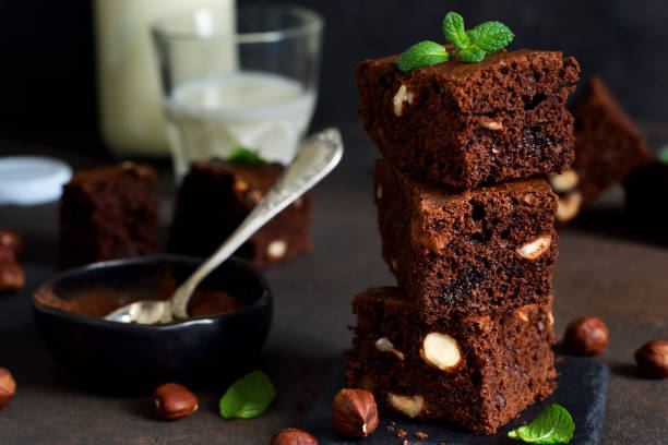 istock Classical American dessert - chocolate brownie with nuts. 905449406