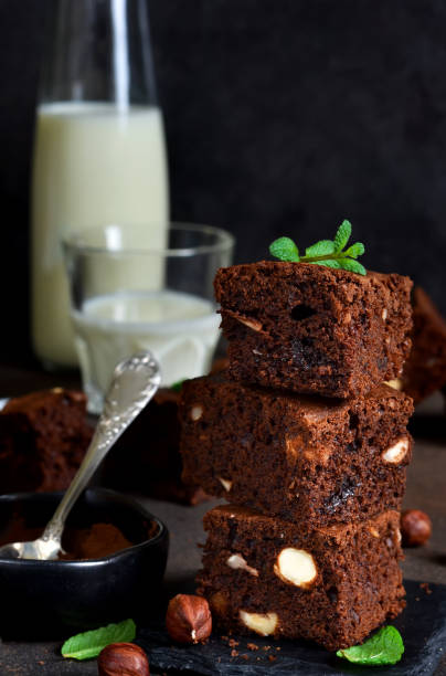 istock Classical American dessert - chocolate brownie with nuts. 905449458