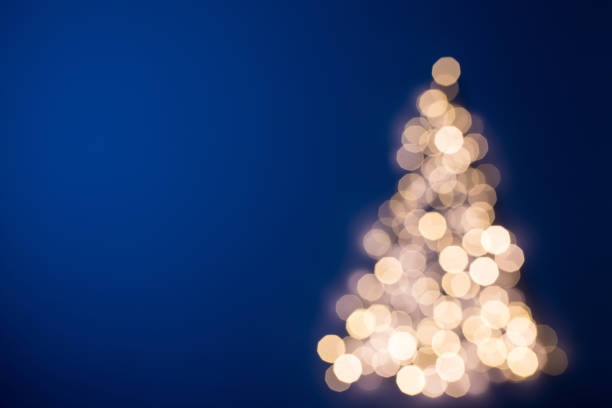 blurred christmas tree, germany - tree set imagens e fotografias de stock