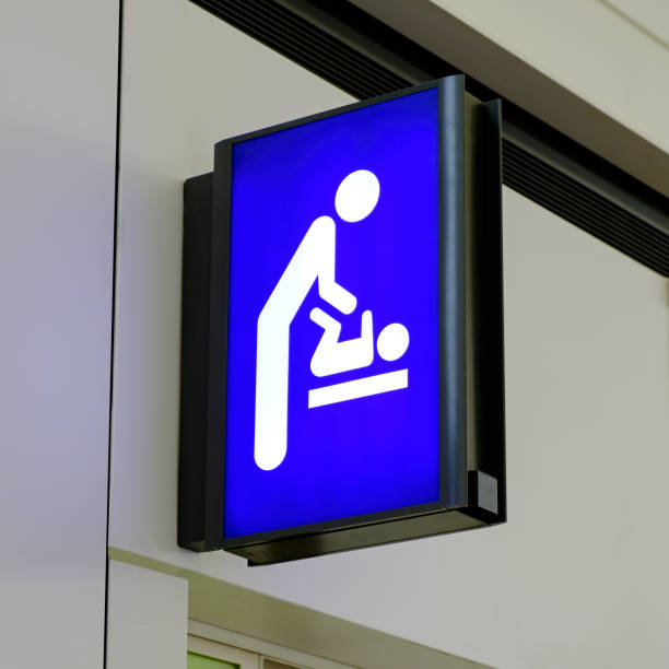 istock Baby Changing Sign Lightbox in the airport 905453312