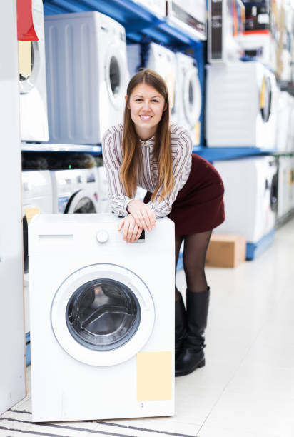 istock seller showing washing machine 905454336