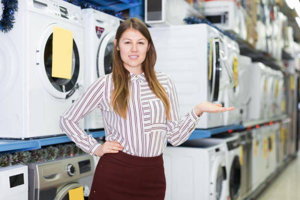 istock female offering clothes washer 905455974