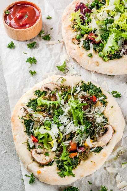 istock Vegan pizza with fresh vegetables 905468018