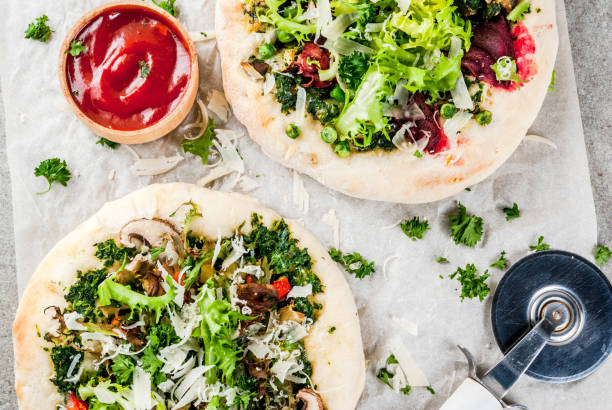 istock Vegan pizza with fresh vegetables 905468072