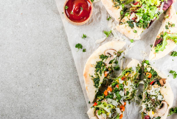 istock Vegan pizza with fresh vegetables 905468150