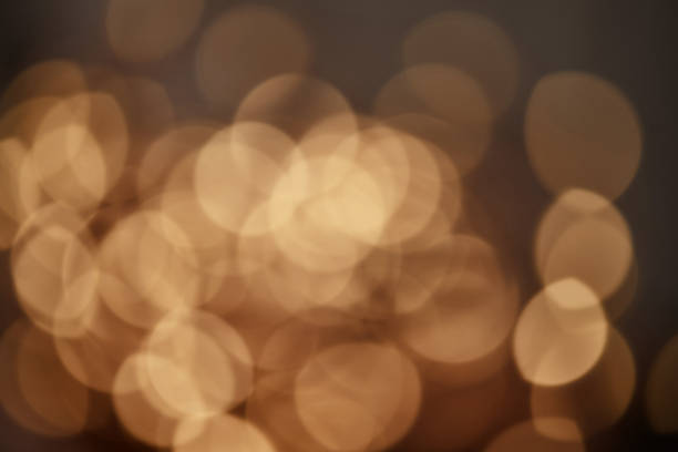 istock golden christmas lights background 905468372