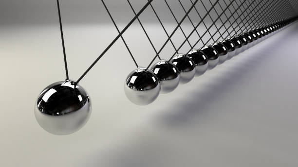 istock cause and effect concept, infinity steel Newton's cradle on a white background (3d illustration) 905472302