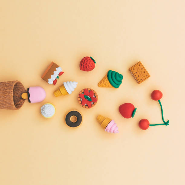 istock dessert sweets fall out of the waffle cone. 905472636