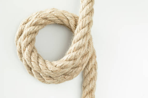 istock Beige cotton rope curl isolated on white color 905472652