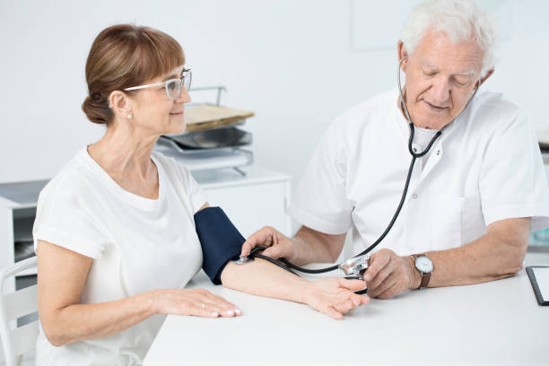 istock Measuring blood pressure 905476922