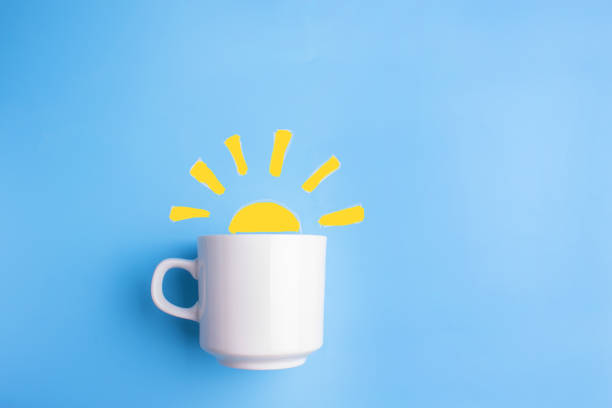 sun and white cup on blue background sun and white cup on blue background. good morning concept monday stock pictures, royalty-free photos & images