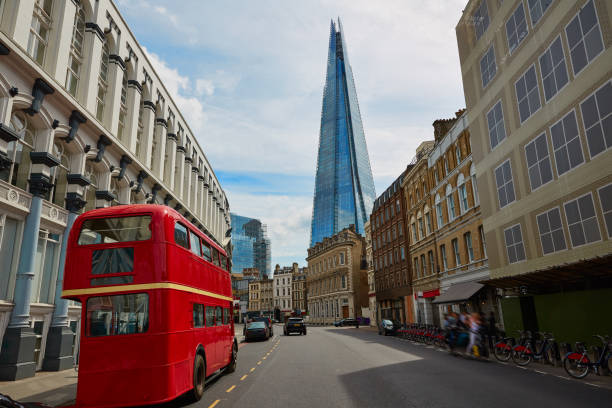 istock The Shard and old London red Bus 905477440