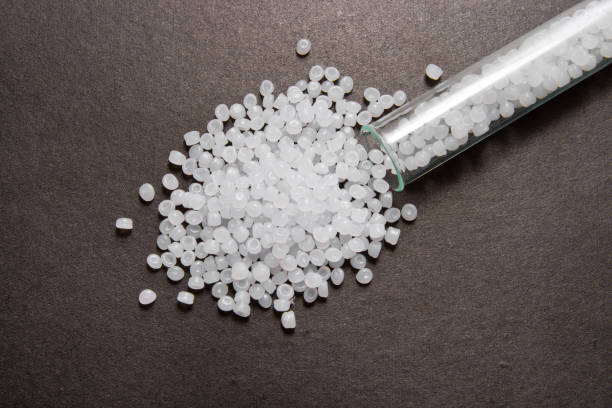 istock Plastic pellets . Plastic raw materials in granules for industry. Transparent polyethylene pellets 905480176