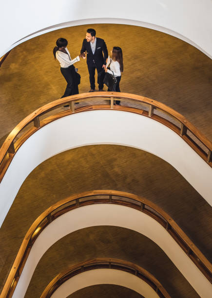 istock Business People Meeting in The Hallway 905480976