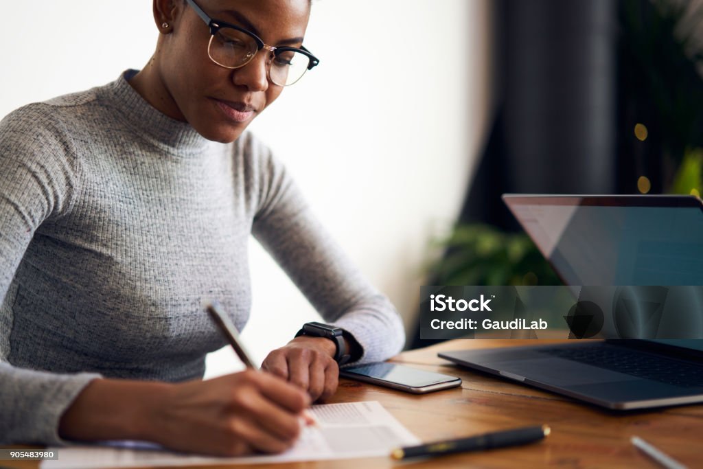 Experienced afro american female owner of business signing contract with corporation for making rebranding campaign to attract customers choosing best professional experts in online database Administrator Stock Photo