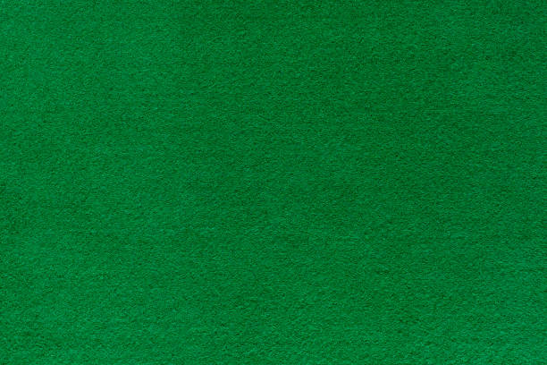 istock Green felt texture for poker and casino. 905484682