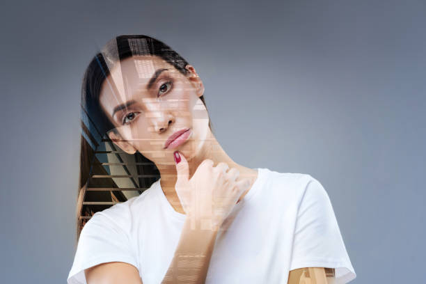 istock Earnest brunette woman thinking about progress 905489350