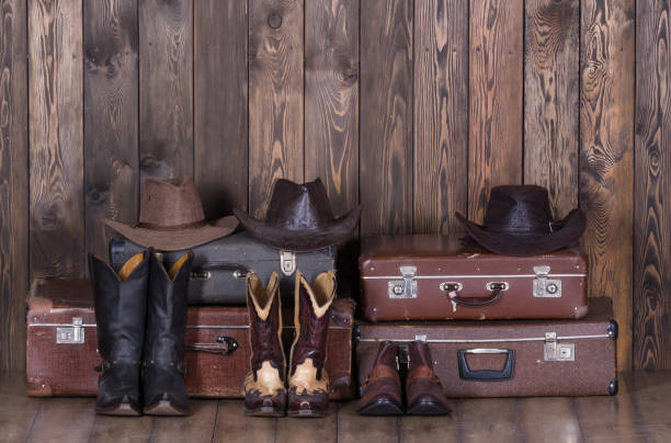 istock cowboy hats on suitcases 905490136