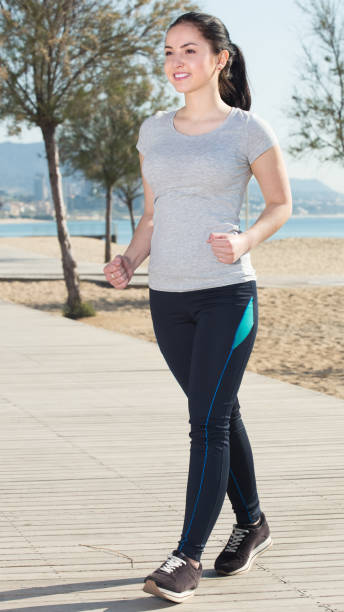 istock Pretty woman race walking 905492554