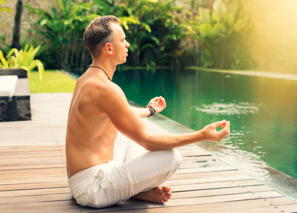 istock Spiritual man meditating in morning 905493196