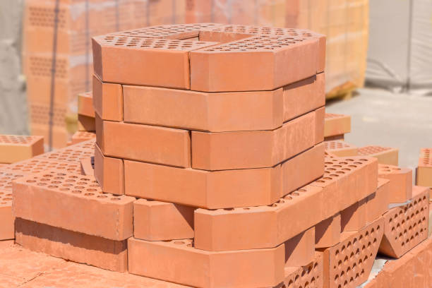 istock Red decorative bricks with bevelled angle on an outdoor warehouse 905497430