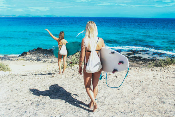 Girls going surfing