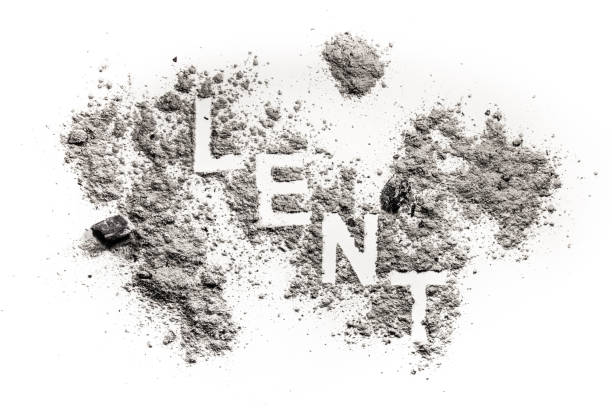 istock Lent word written in ash, sand, dust 905523088