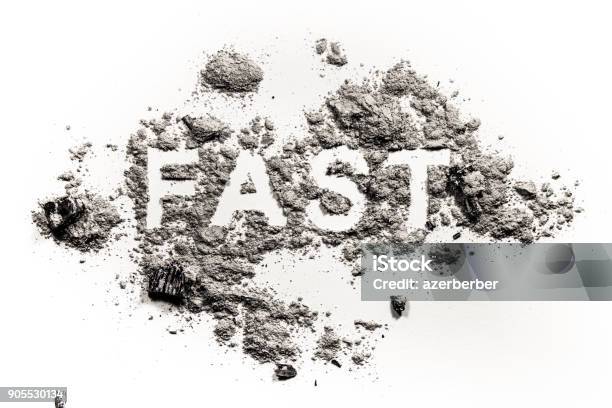 Fast Word Written In Ash Dust Or Sand Stock Photo - Download Image Now - Ash, Ash Wednesday, Catholicism