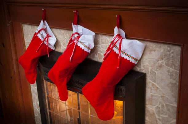 istock Christmas stockings by the fireplace 905530902