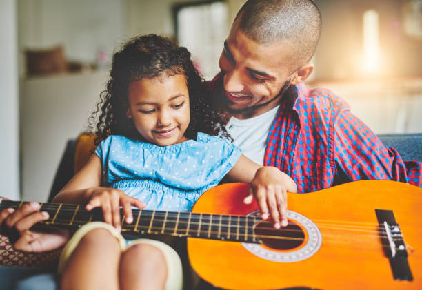 istock Natural born guitarist 905531188