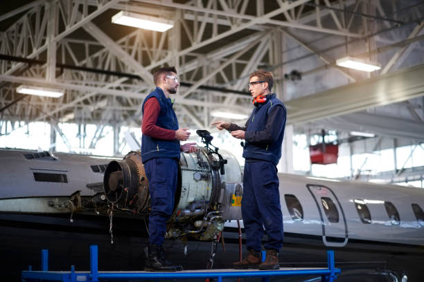 istock Aircraft mechanics in the hangar 905534650