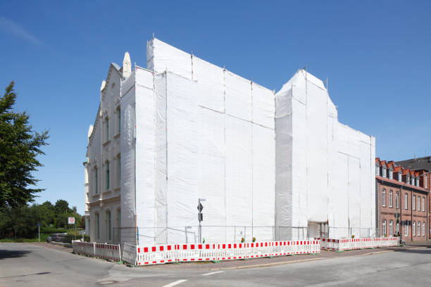 Tarpaulin, construction site, scaffolding, house façade stock photo