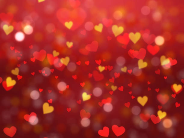istock Valentine's Day background with heart shaped bokeh lights 905543588