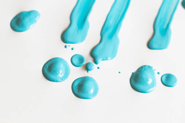 istock Turquoise or blue paint color in liquid trace line and dot drop form 905544488