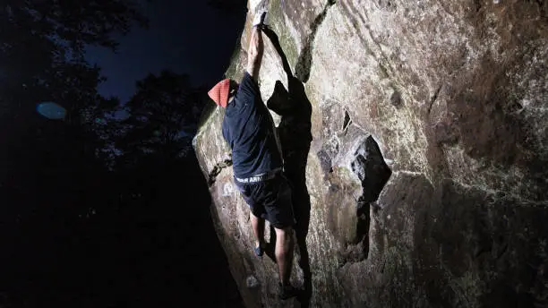 Free climbing at night in the Hallejulia quarry in the Teutoburg Forest