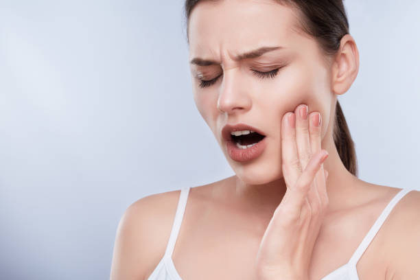 Woman with toothache stock photo