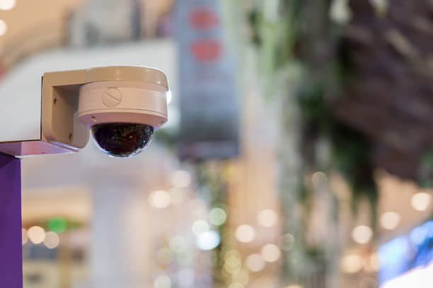 istock Close-curcuit television,Security CCTV in office blurred  background for save vedio anti theft and crime in place. 905574932