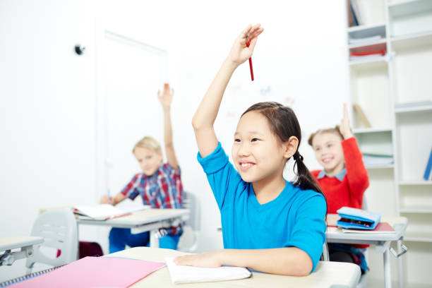 istock Happy schoolgirl 905579126