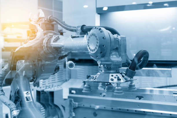 istock The robot for metal forming process in light blue scene. 905580200